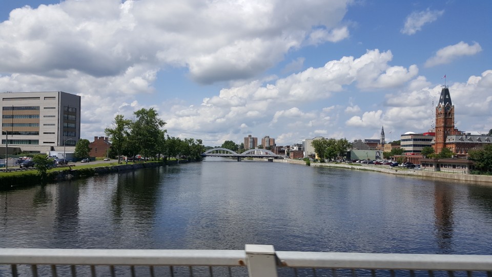 Moira River beside Belleville City Hall, July 2017; downtown riverfront context.