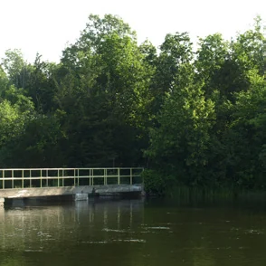 River and walkway at Bata Island, as pictured beside its entry in the City’s 2024 trail guide.