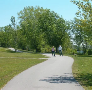 Paved waterfront path at Centennial Park in Trenton, as pictured in the City’s 2024 trail guide.