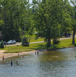 Shoreline and park grounds at Frankford Tourist Park, as pictured in the City’s 2024 trail guide.
