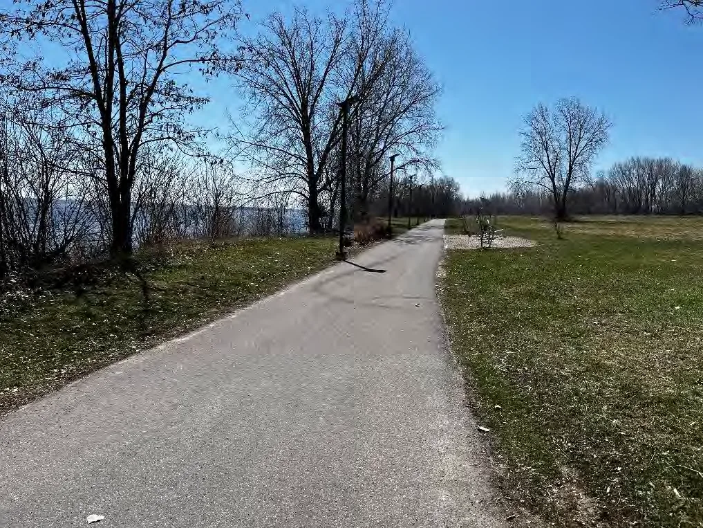 Paved Millennium Trail looking south from the Creswell Drive access in Trenton, photographed by A.S.I. in 2023.