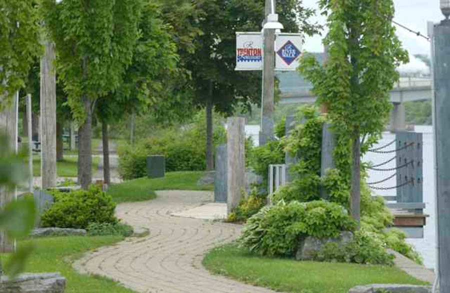 Paved waterfront path beside the water in downtown Trenton